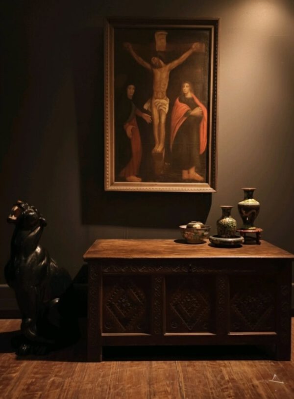 Christ Painting and Black Panther Statue