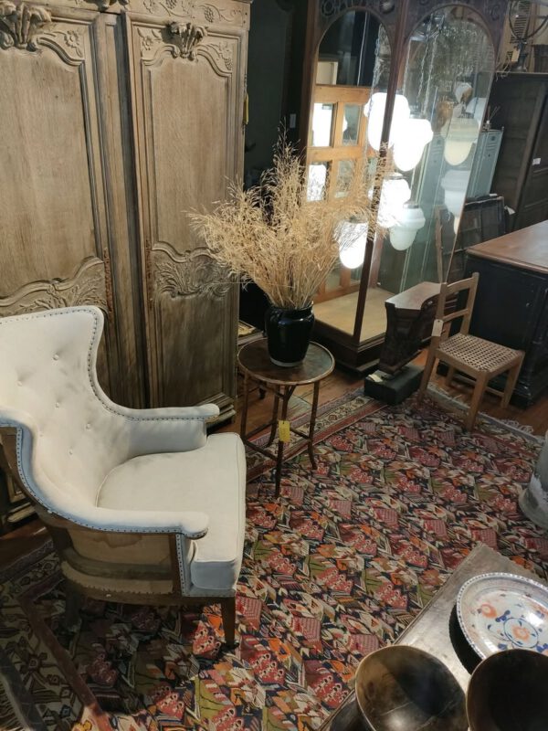 Bergere Wingback Chair, French Oak Armoire, Bamboo Side Table and Kilim carpet